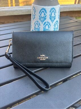 Coach crossgrain black leather flap phone wallet wristlet